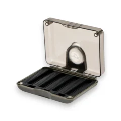 Korda Hook Safe shown open on a white background, displaying the silicone hook storage tray and built-in magnifying lens.