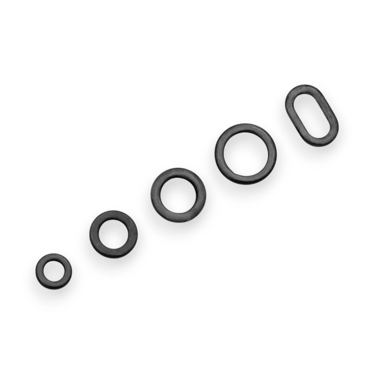 Korda Rig Rings full range shown without packaging, clearly laid out in size order on a white background.