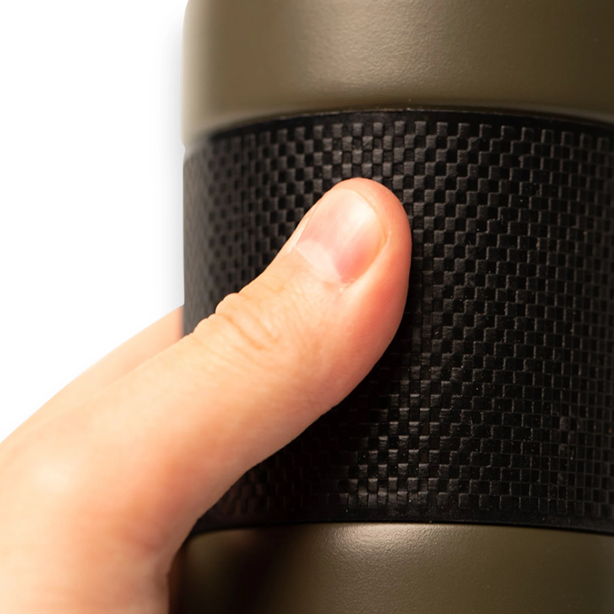 Trakker Armolife Thermal Coffee Press Mug showing the silicone grip being held against a white background