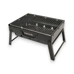 Trakker Armolife BBQ v2 fully assembled on its folding legs on a white background