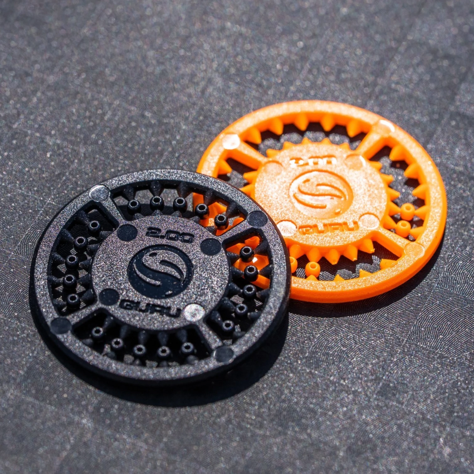 Close-up of Guru Slider Beads showing fine internal bore and smooth plastic finish designed for slider fishing rigs
