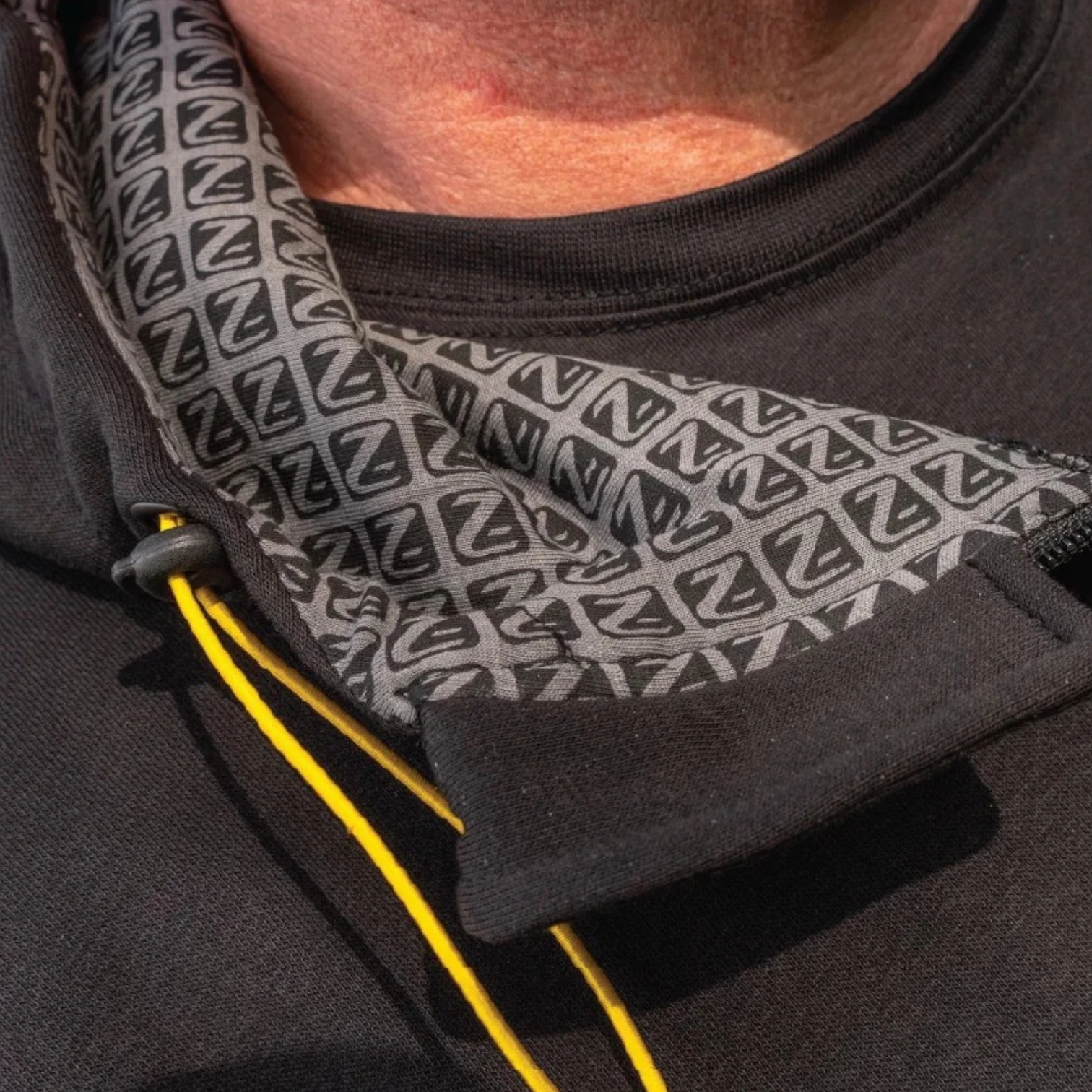 Close up of NuFish Quarter Zip Hoodie contrast colour panel and fabric detail