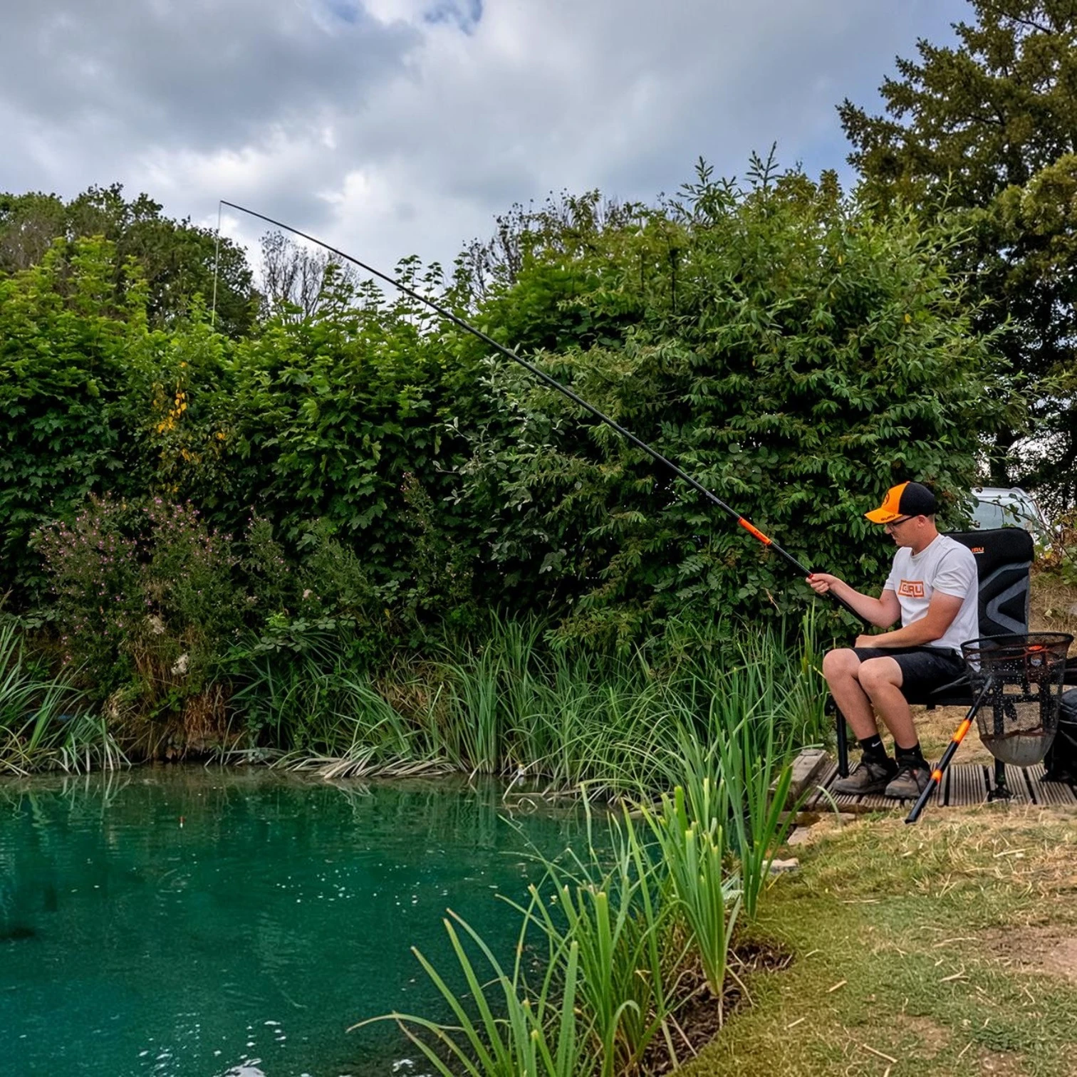 Angler using a Guru Elasticated Whip Kit while fishing on the bank