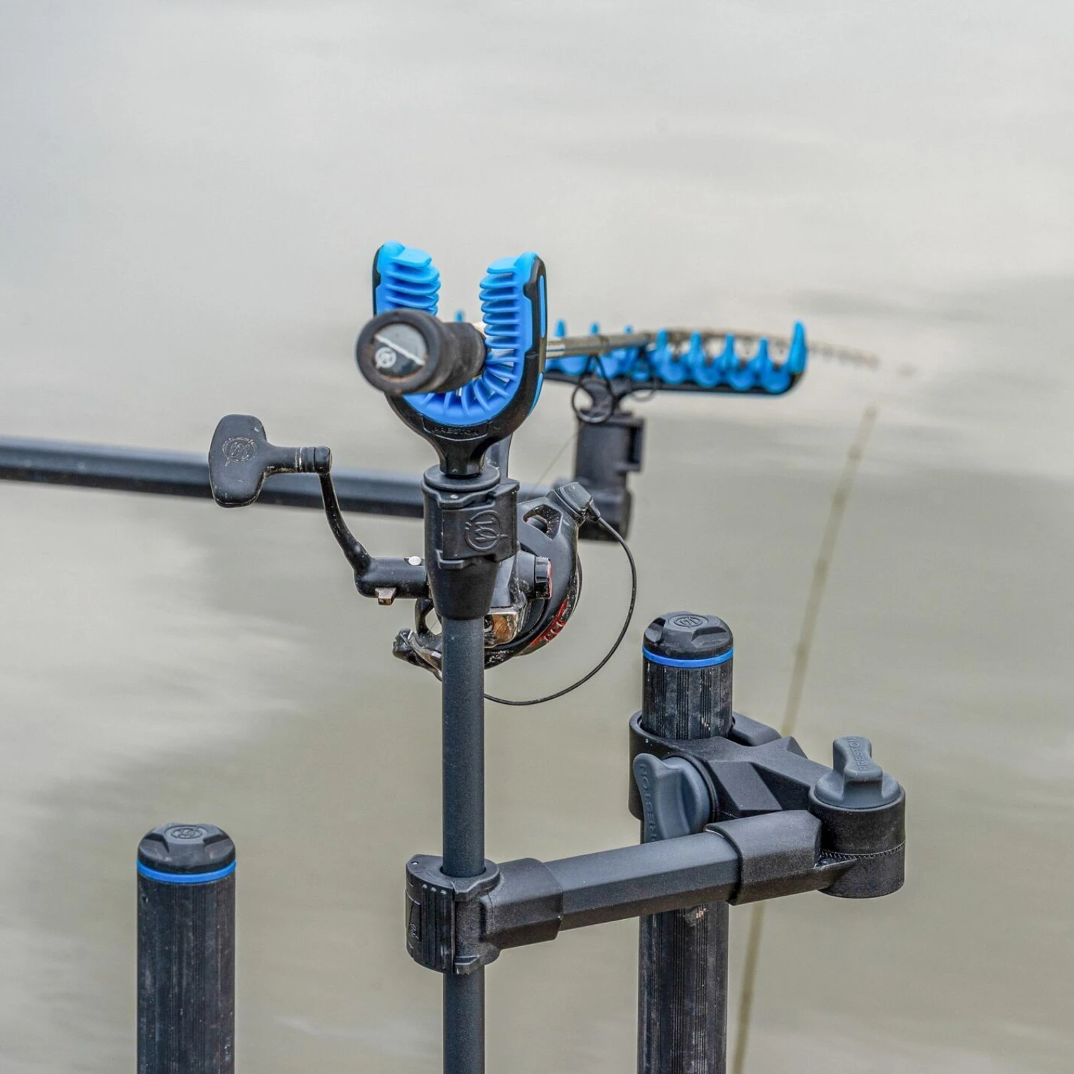 Preston Offbox Rotating Butt Rest Arm shown in use supporting a fishing rod.