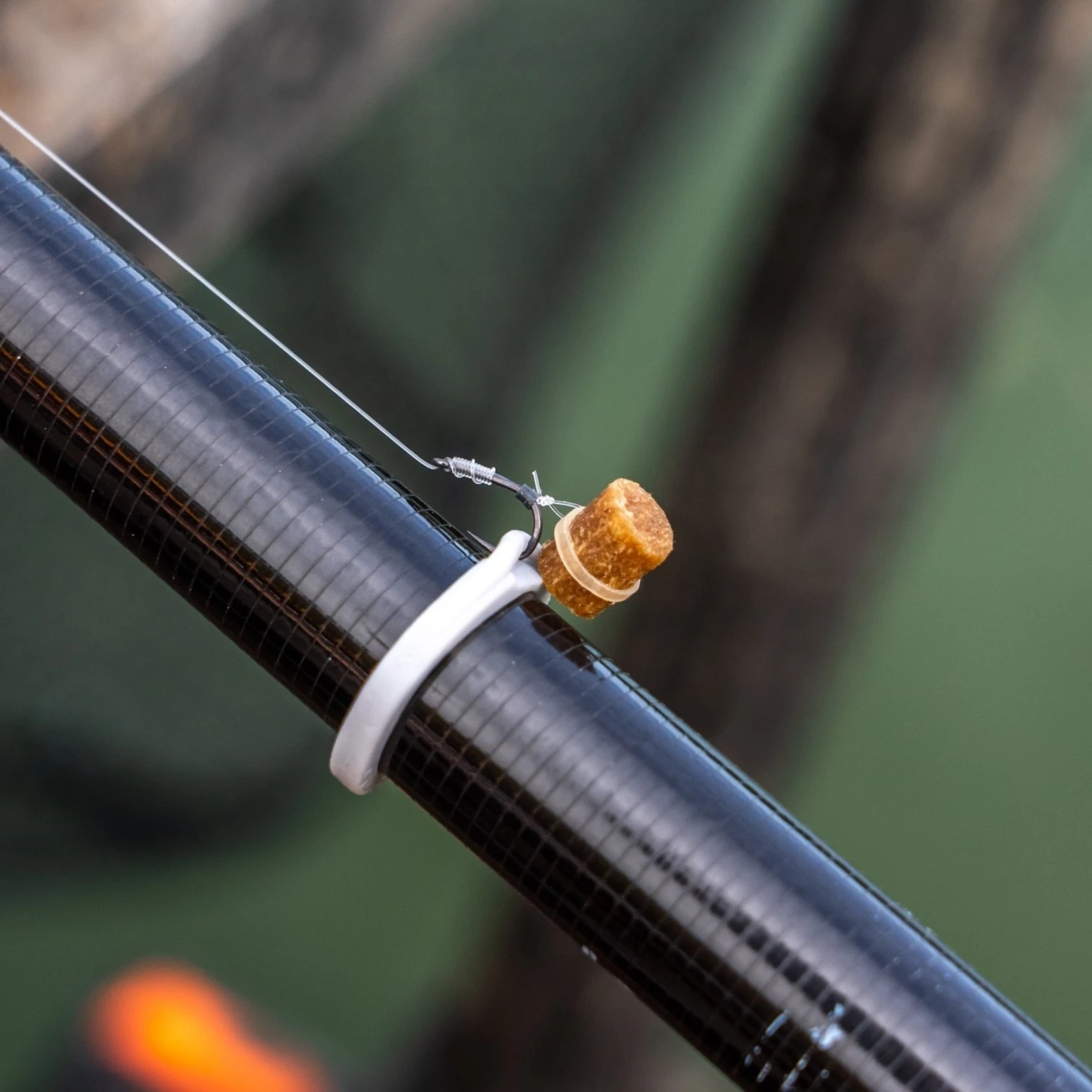 Close-up of a Guru Rig Hook Up in use on a pole, securely holding the rig in place.